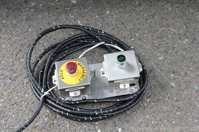 Pause and Hold buttons for the Motoman