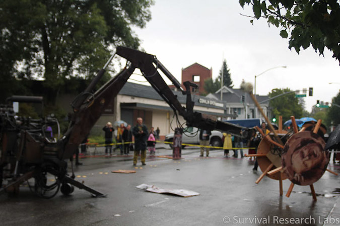 Big Arm vs Stick Wheel Robot