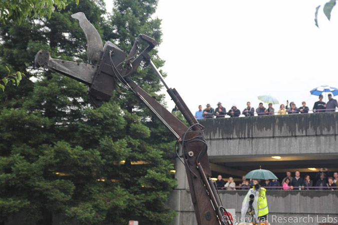Big Arm and audience on the garage