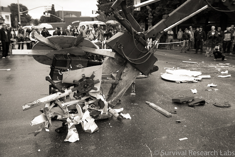 Big Arm demolishes the Stick Wheel Robot