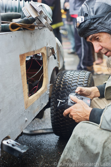 Shannon examines the damage to the BlenderBot